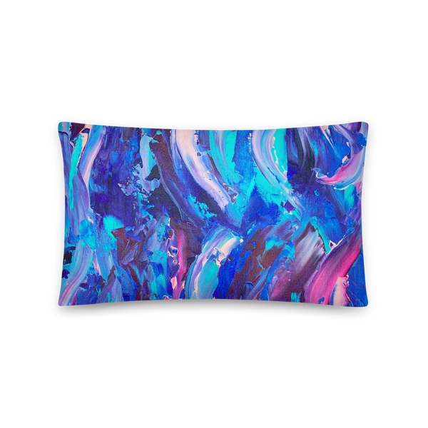 Decorative throw pillow with blue, purple and pink ribbons