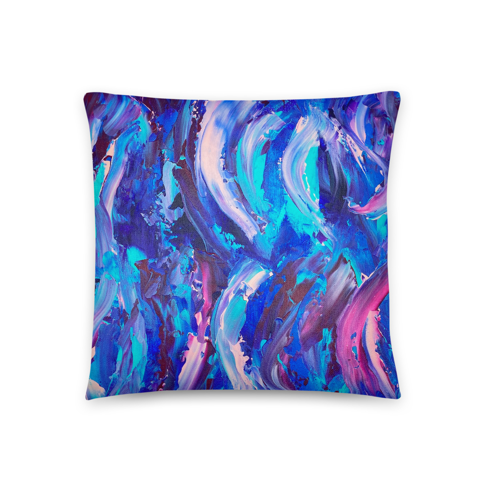 Decorative throw pillow with blue, purple and pink ribbons