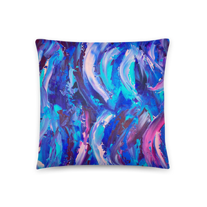 Decorative throw pillow with blue, purple and pink ribbons