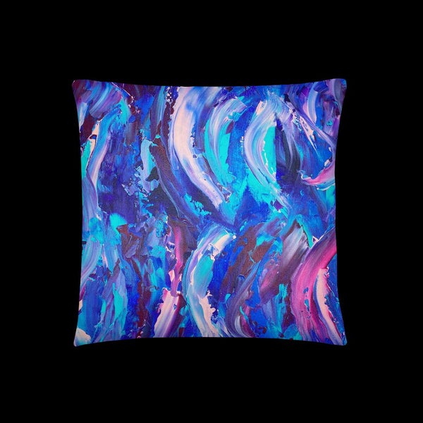 Decorative throw pillow with blue, purple and pink ribbons