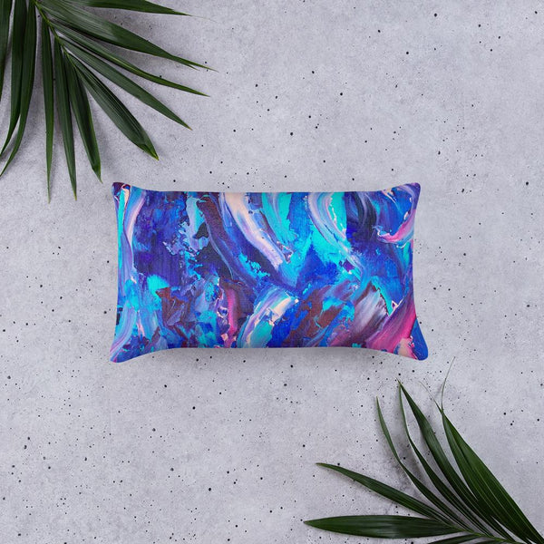 Decorative throw pillow with blue, purple and pink ribbons