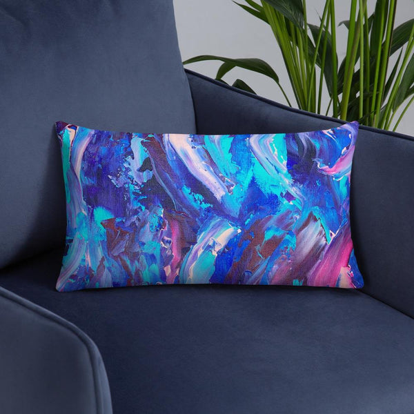Decorative throw pillow with blue, purple and pink ribbons